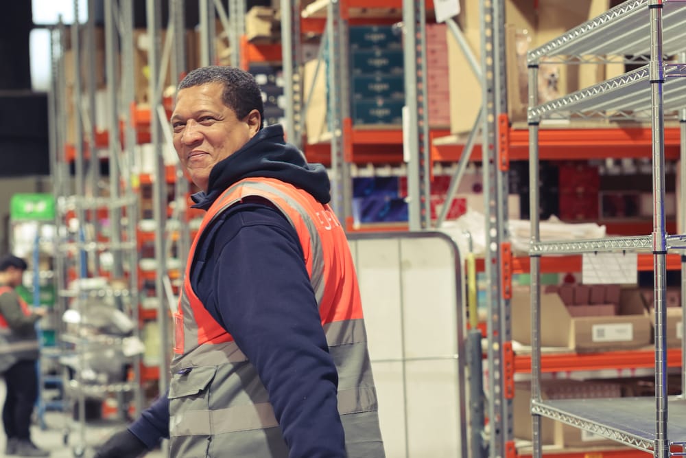 A FULFIL.X team member checking stock in one of our fulfilment centres